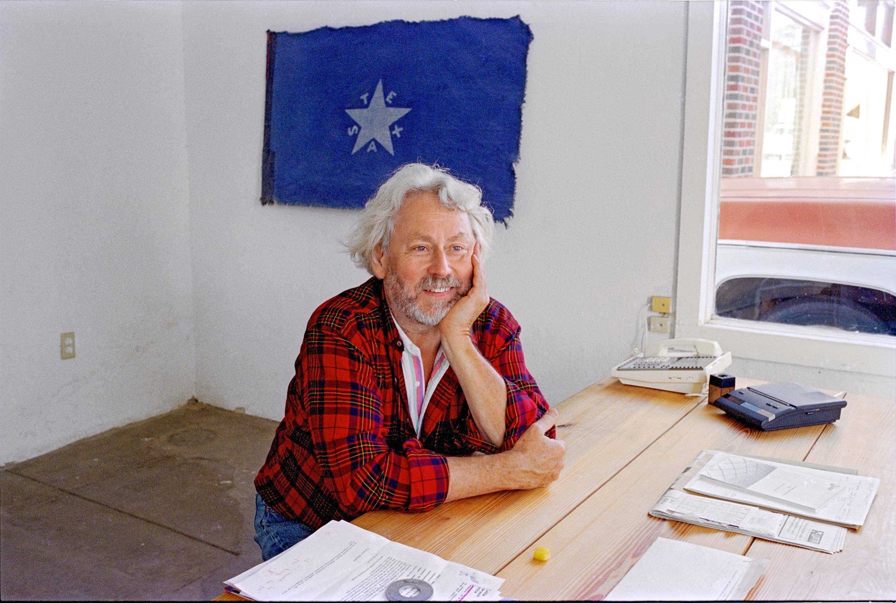 Donald Judd sits at a table in his Architecture Office, Marfa, Texas.