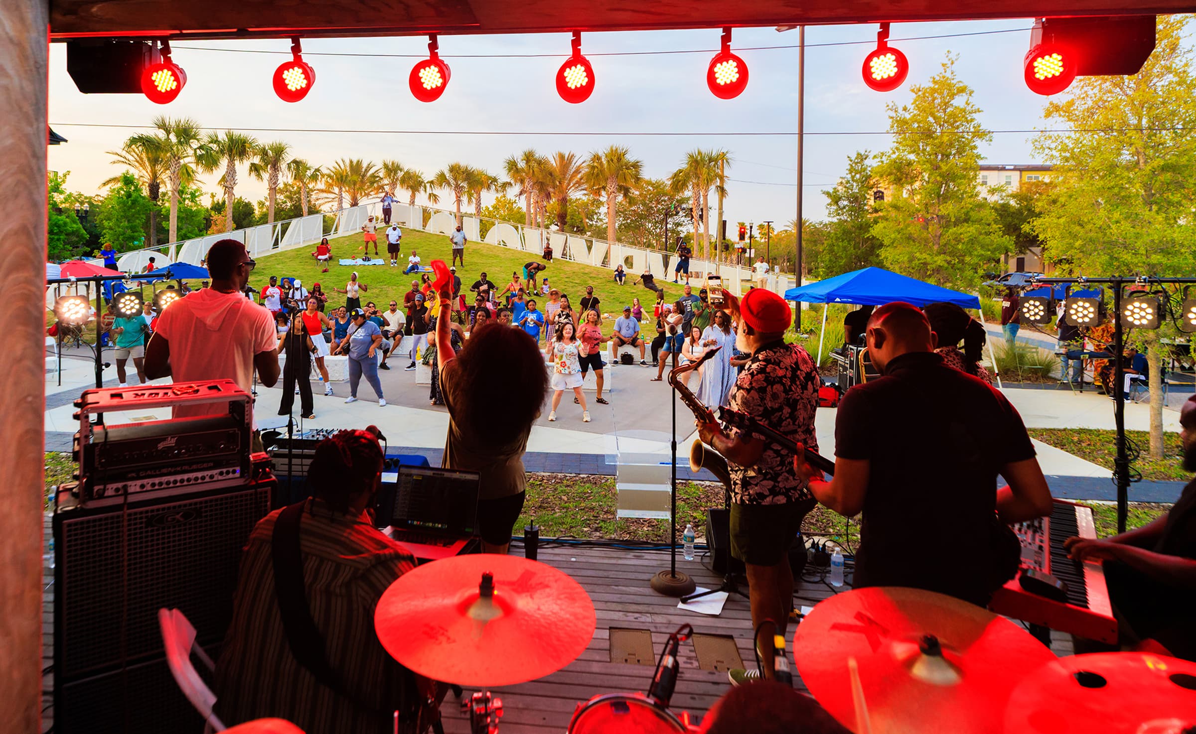 A band playing on the stage at Lift Ev’ry Voice and Sing Park.